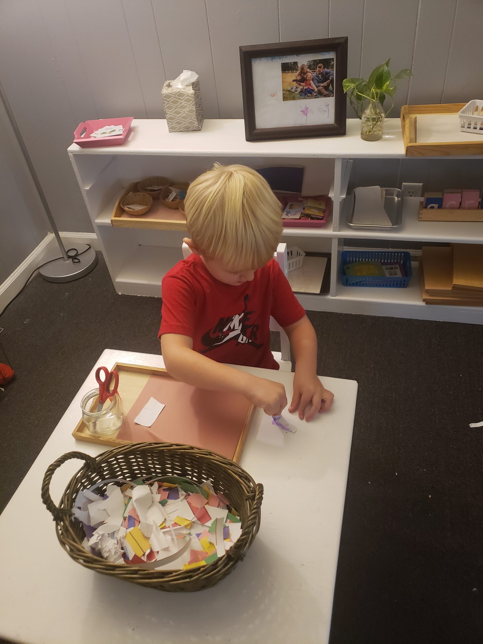 A kid doing paper crafts